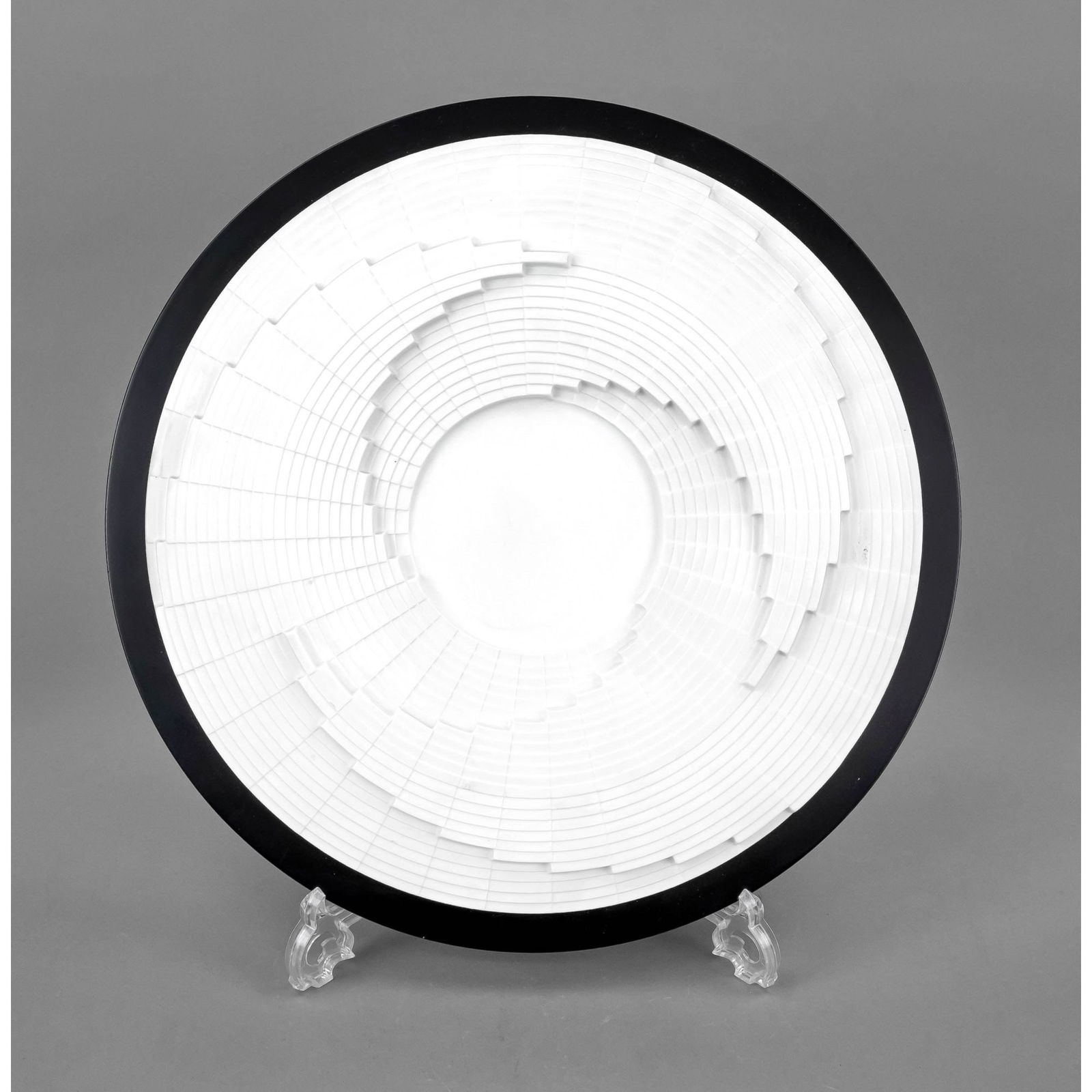 Artist's relief plate 'Dimensioni: Artist's relief plate 'Dimensioni (tri onda)', after Marcello Morandini (born 1940), Rosenthal studio line, limited edition 1981, relief tondo made of white bisque, on black wooden plate for wall moun