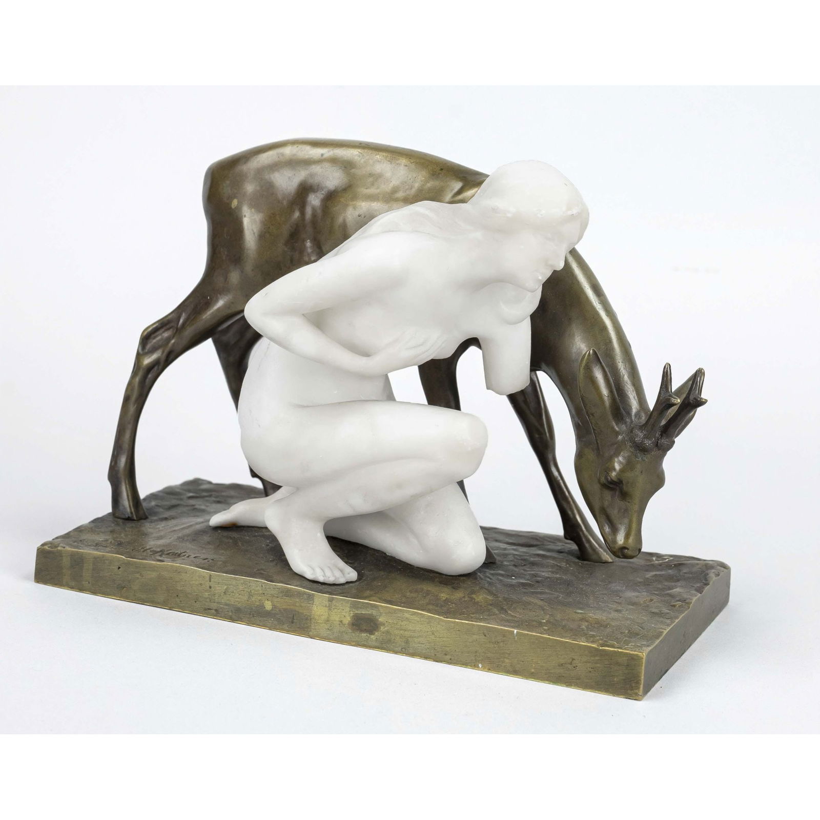 Erich Schmidt-Kestner (1877-194: Erich Schmidt-Kestner (1877-1941), female nude kneeling next to a roebuck, Art Nouveau group on greenish patinated bronze and alabaster, signed in the rectangular plinth, the left arm of the figure mi