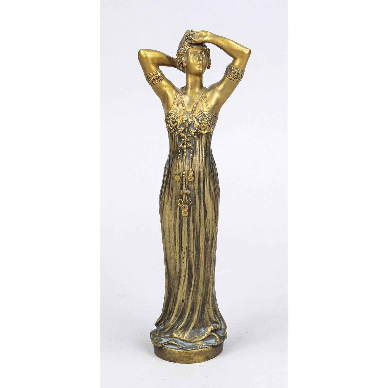 Alexandre Vibert (1847-1909), s: Alexandre Vibert (1847-1909), small art deco statuette of a young woman in a strap dress with pointed hat and rich jewelry, gold patinated bronze, signed and stamped on the reverse, ''JQ Edit'', h. 24