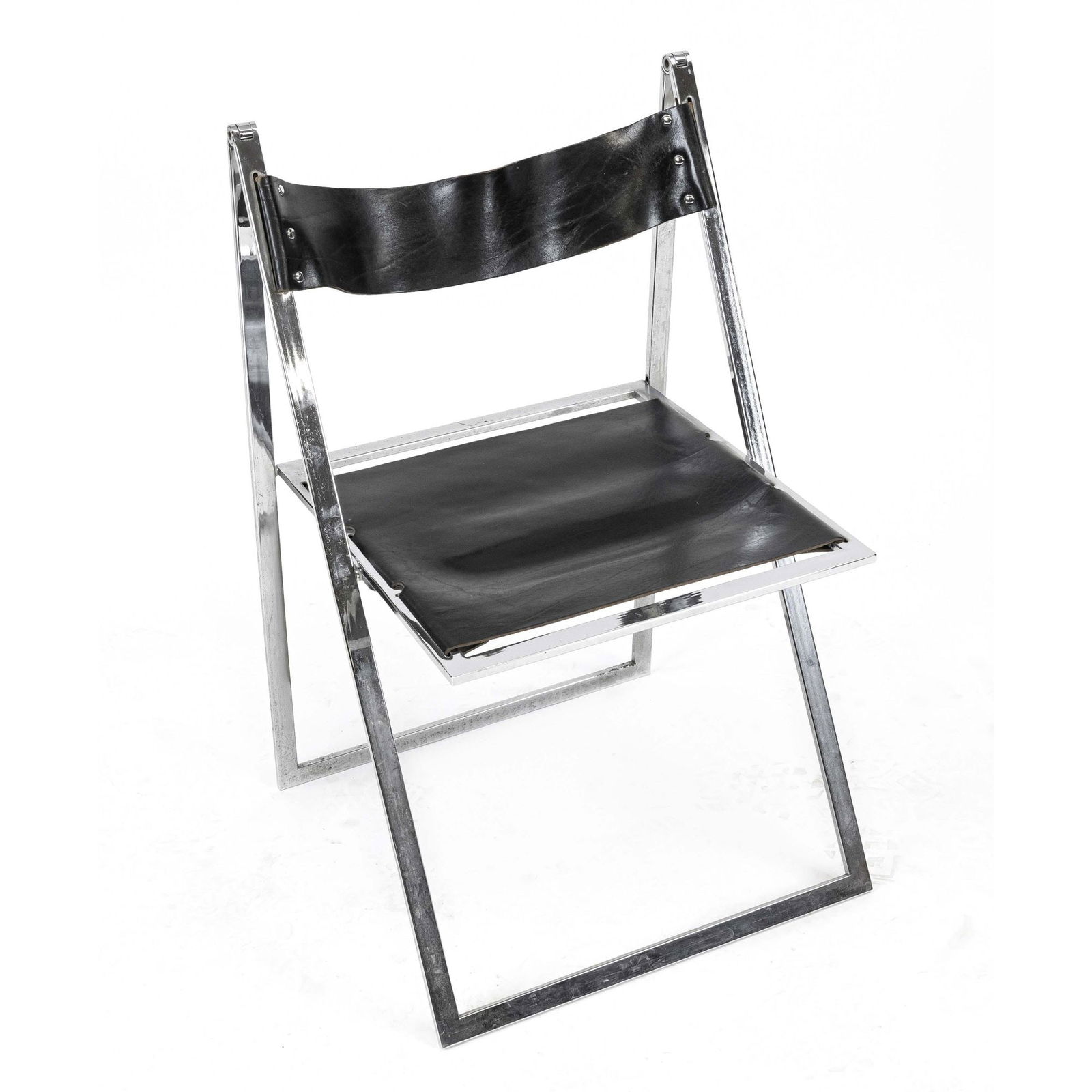 Folding chair ''Hülsta'', Lübke /: Folding chair ''Hülsta'', Lübke / Interlübke, chrome-plated flat steel frame with black leather and tension springs, without the plastic feet, signs of wear, h. 82 cm