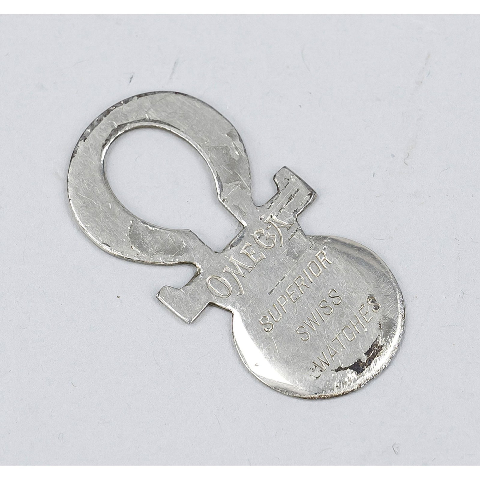 Omega case opener, chrome-plate: Omega case opener, chrome-plated, rare, length 4.5 cm