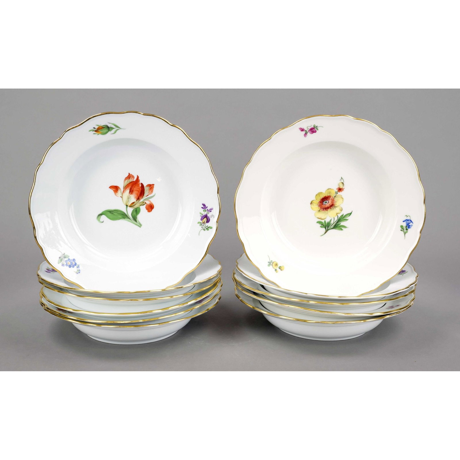 Eleven soup plates, Meissen, 20th: Eleven soup plates, Meissen, 20th century, Deputat, New Cut-out shape, polychrome flower painting, flower 1 with gold rim, partly rubbed, Ø 23.5 cm