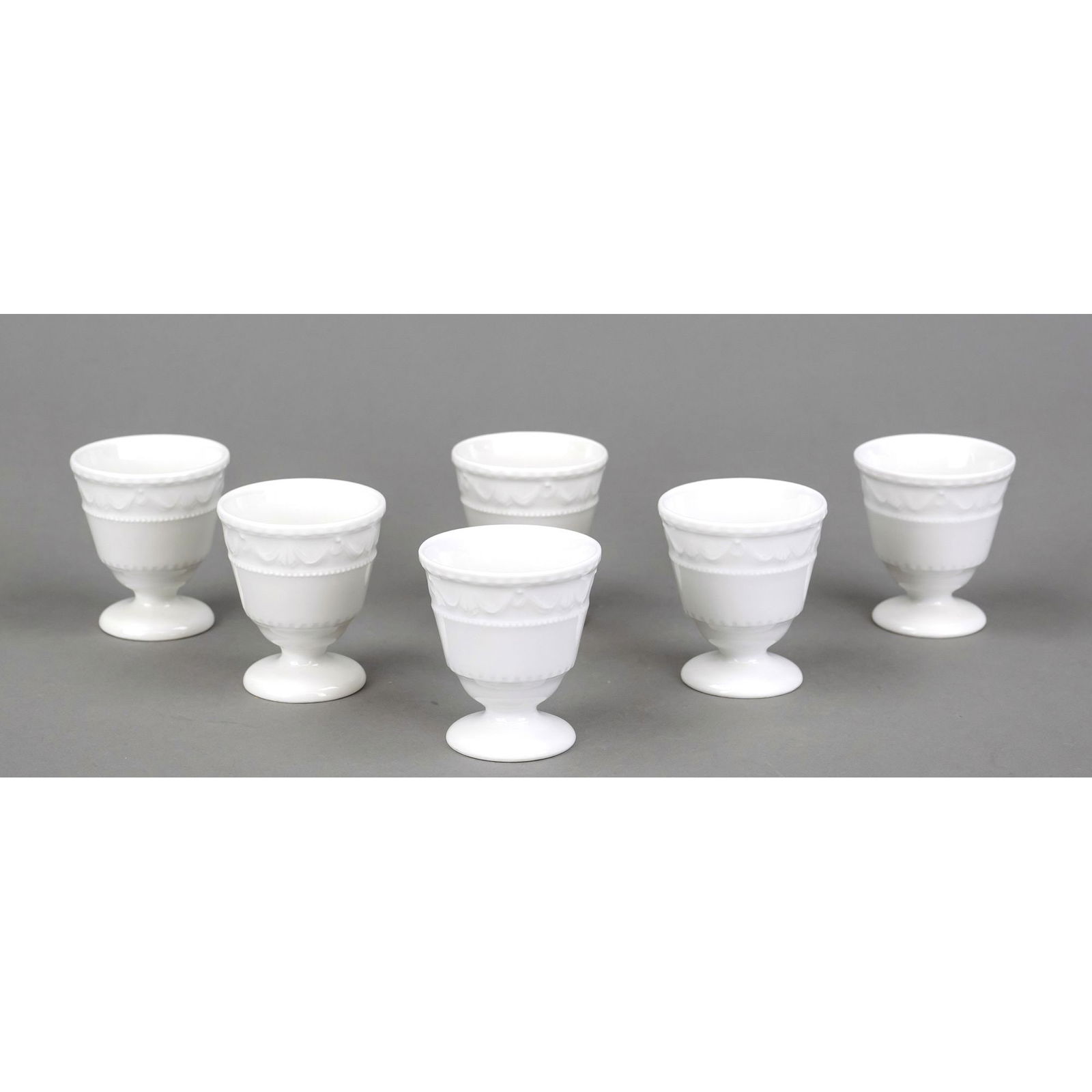 6 egg cups, KPM Berlin, marks 196: 6 egg cups, KPM Berlin, marks 1962-1992, 2nd choice, Kurland shape, designed for the last Duke of Courland c. 1790 by Friedrich Elias Meyer, white, h. 6 cm