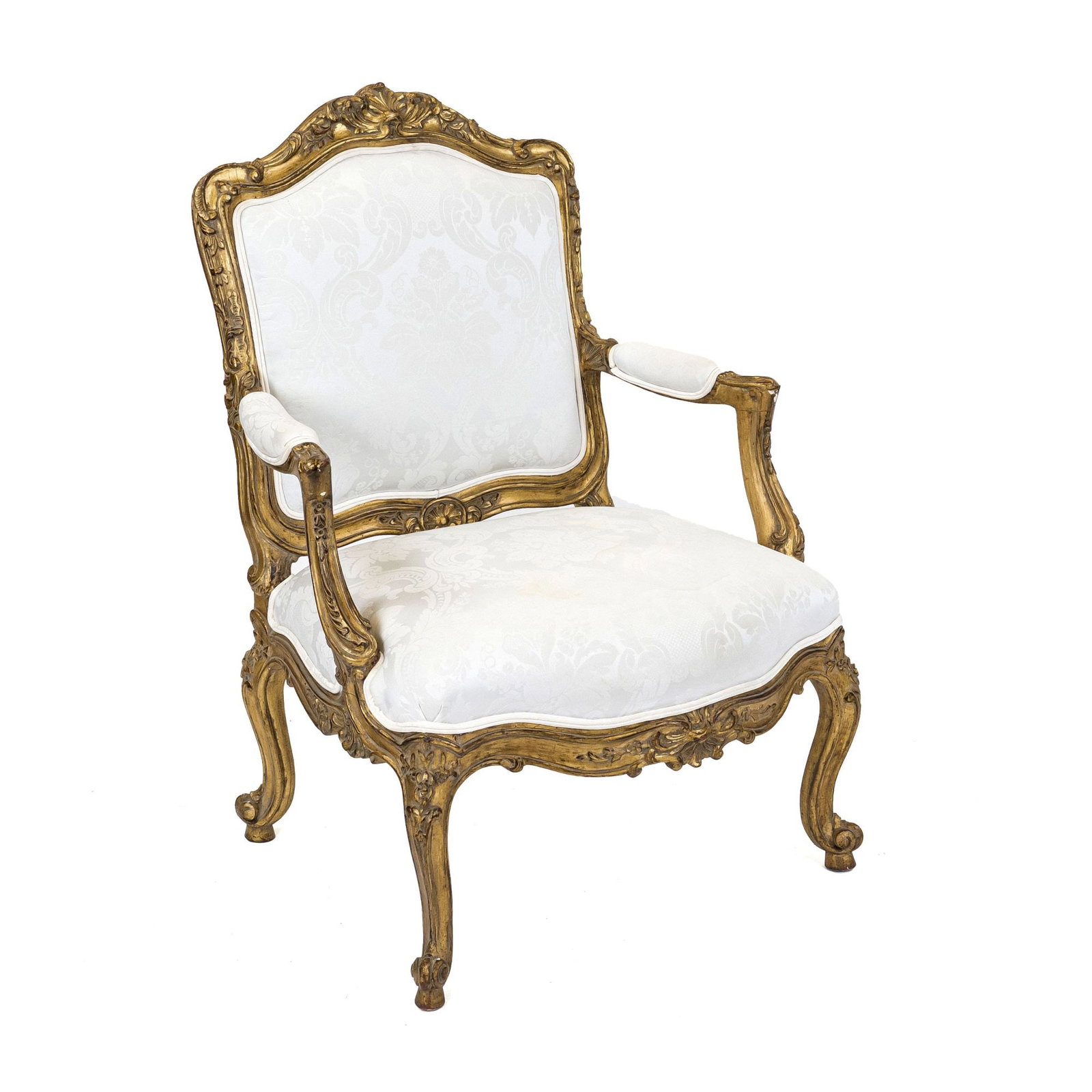 Louis Quinze style armchair, 19th: Louis Quinze style armchair, 19th century, carved and gilded beech wood, backrest with rocaille crowning, fitted, slightly curved frame on curved legs, cover with signs of wear, 106 x 76 x 77 cm. - Th