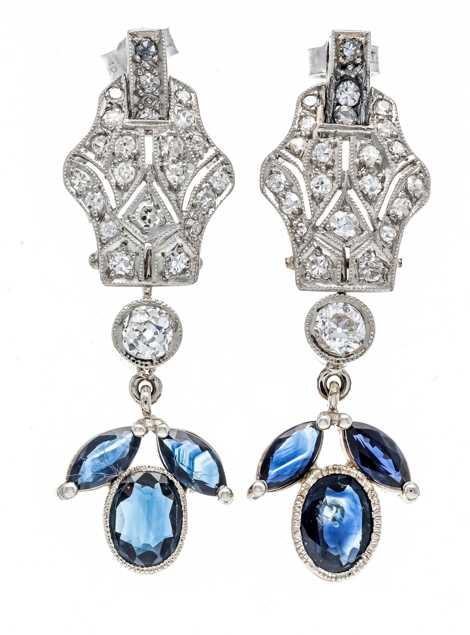 Art Deco sapphire diamond ear studs, p: Art Deco sapphire diamond ear studs, platinum and WG, unmarked, tested, with 2 oval and 4 navette-shaped faceted sapphires 7.3 x 6.0 and 6.6 x 3.4 mm in fine blue tones, transparent with internal feat