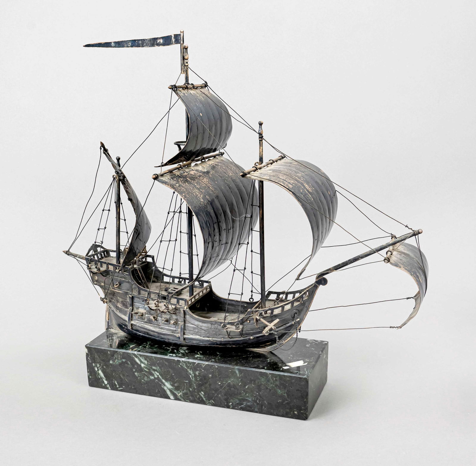 Model of a sailing ship, 20th century,: Model of a sailing ship, 20th century, silver tested, three-master with full sails, l. 42 cm, on a marble base, l. 26 cm