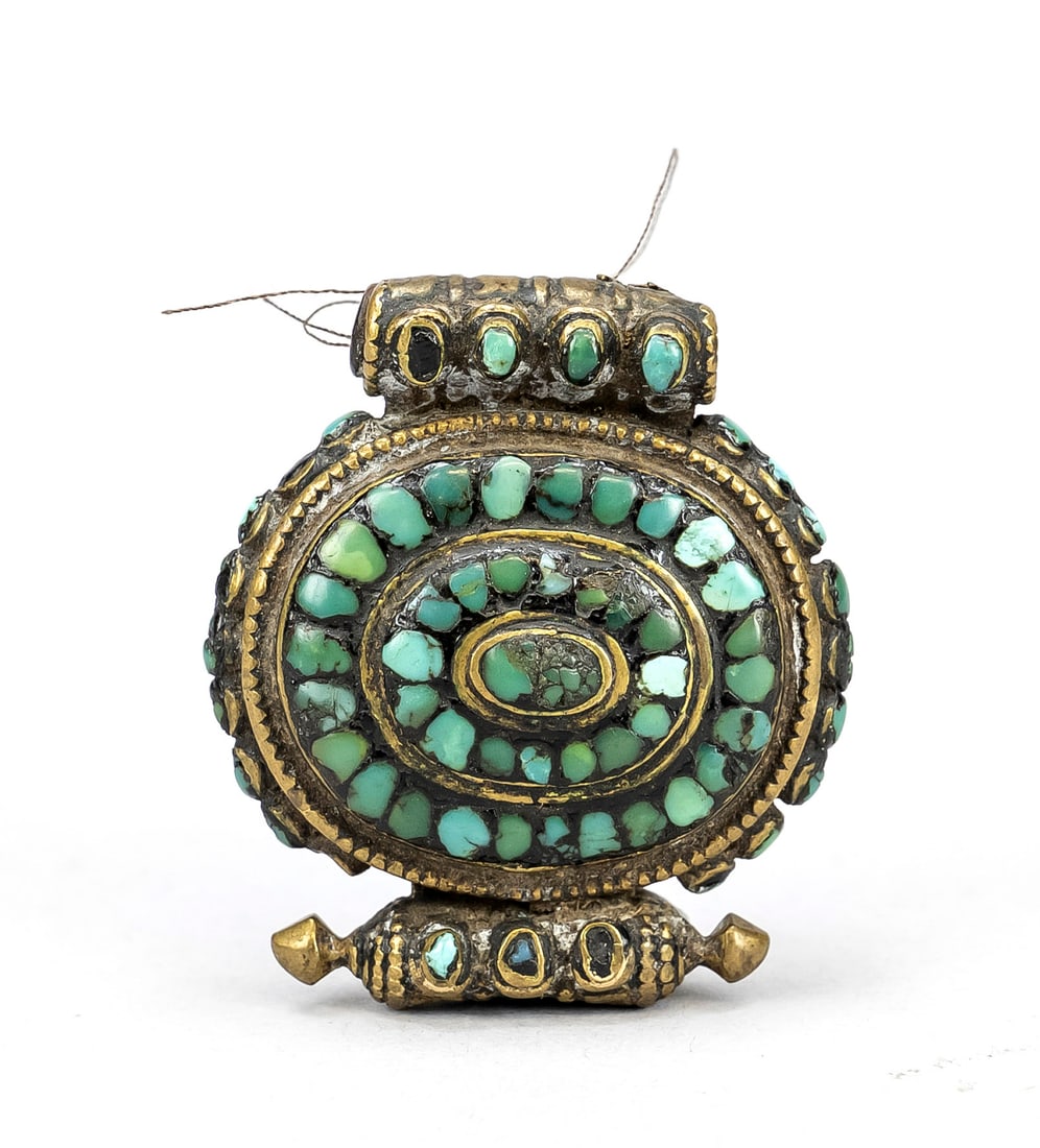 Pendant, amulet, Tibet probably 18th c: Pendant, amulet, Tibet probably 18th century, copper/brass with set turquoises, rubbed and chipped, d. 4.5 cm