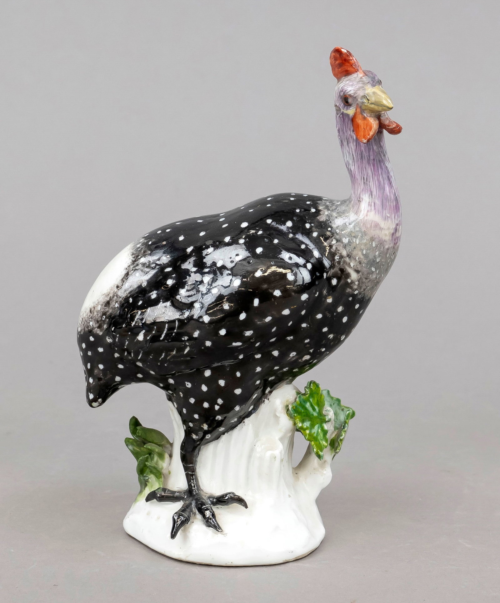 Guinea fowl, Meissen, w. 18th cen: Guinea fowl, Meissen, w. 18th century, designed by Johann Joachim Kaendler (1706 Dresden - 1775 Meissen) in 1735, model no. 140, polychrome painted in naturalistic colors, restored, h. 16 cm