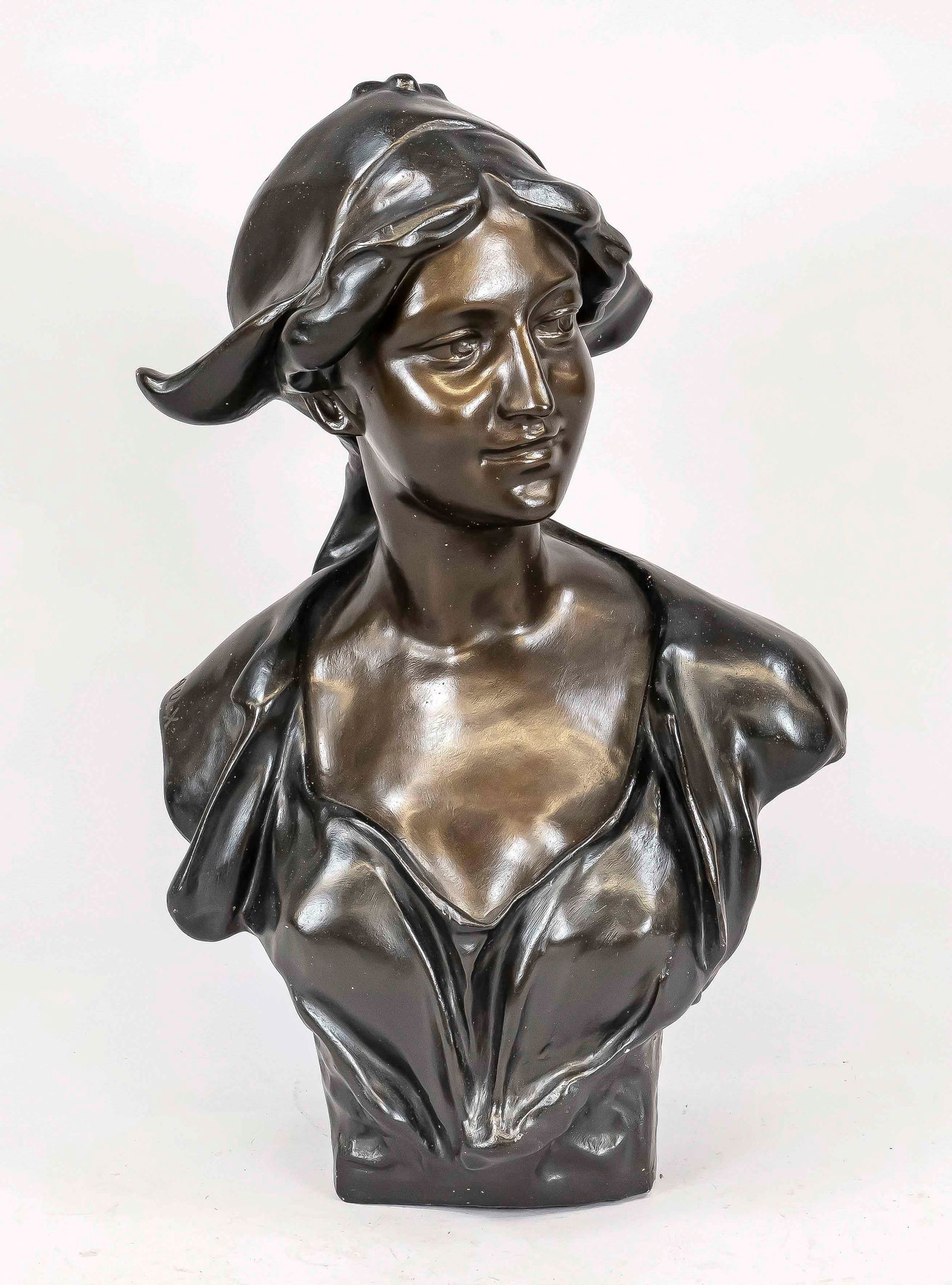 Jef Lambeaux (1852-1908), life-si: Jef Lambeaux (1852-1908), life-size bust of a young woman, plaster bust painted in two shades of bronze, signed on the shoulder, chipped, h. 69 cm