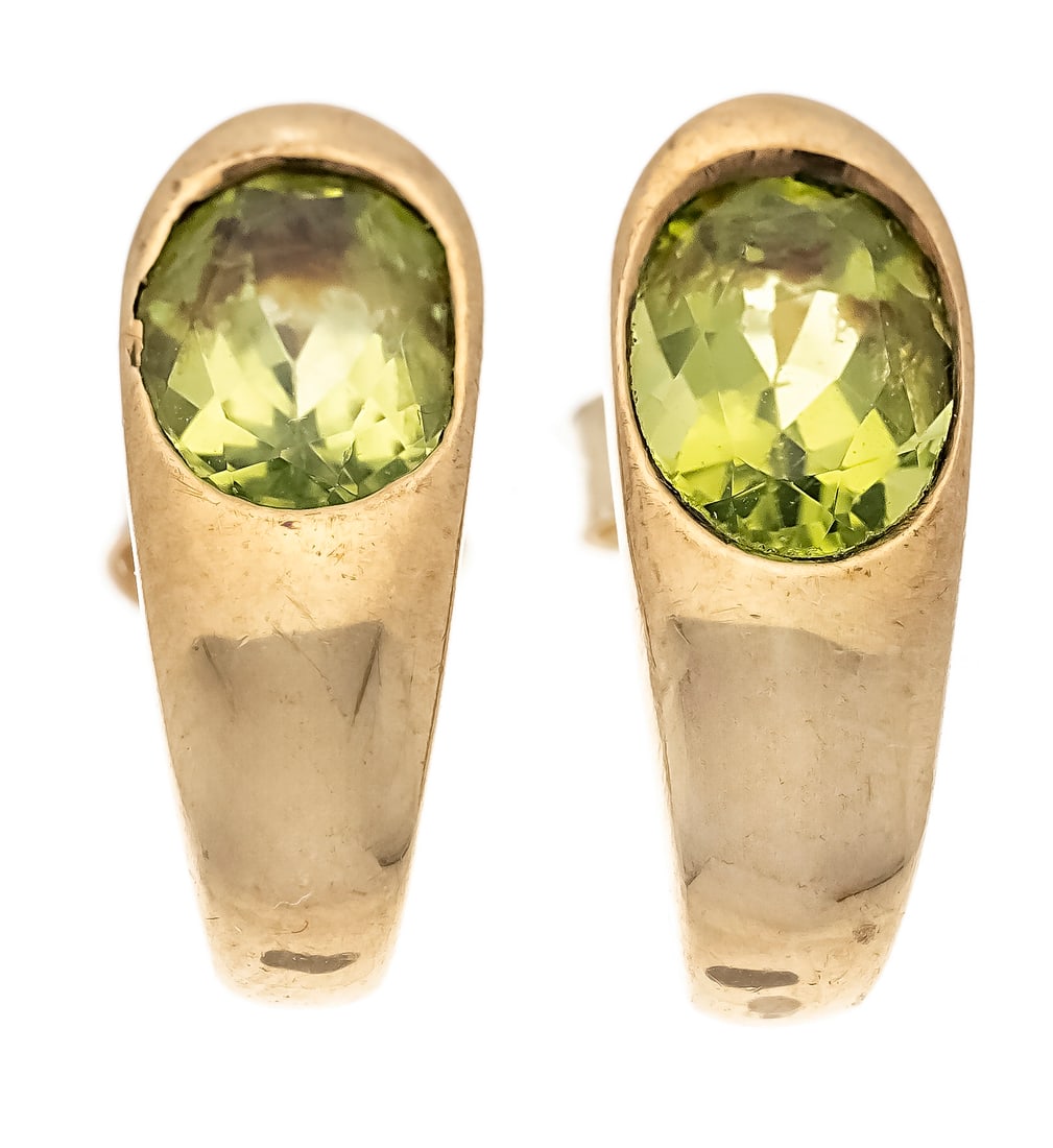 Peridot stud earrings GG 333/000: Peridot stud earrings GG 333/000 with 2 oval faceted peridots 7 x 5 mm, l. 14 mm, 2.4 g