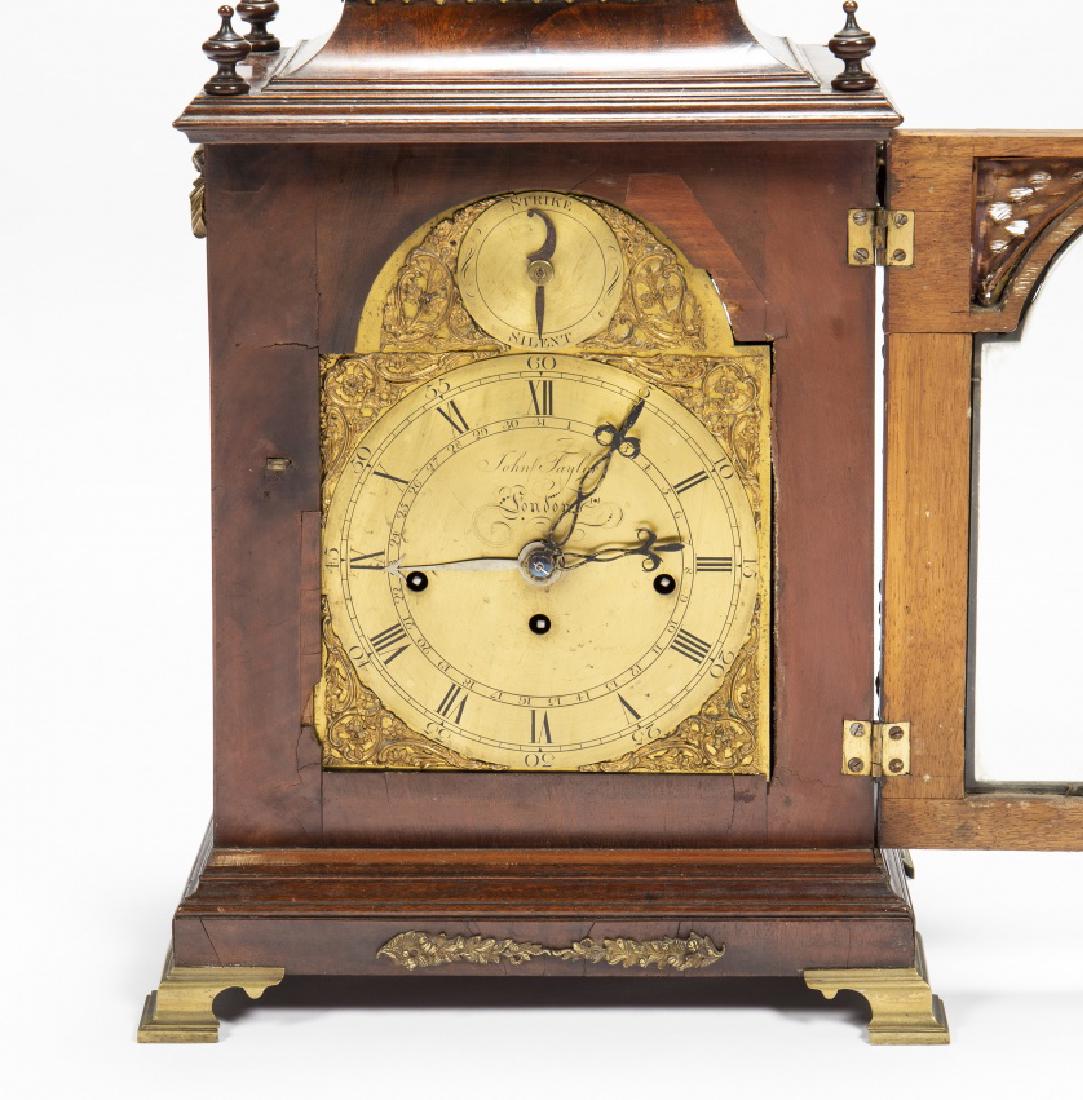 English "bracket" clock with case in mahogany and gilt: English "bracket" clock with case in mahogany and gilt bronze, last quarter of the 18th Century Clockmaker John Taylor of London. Carrillon sound system, chimes hours and half hours. Silence selector.