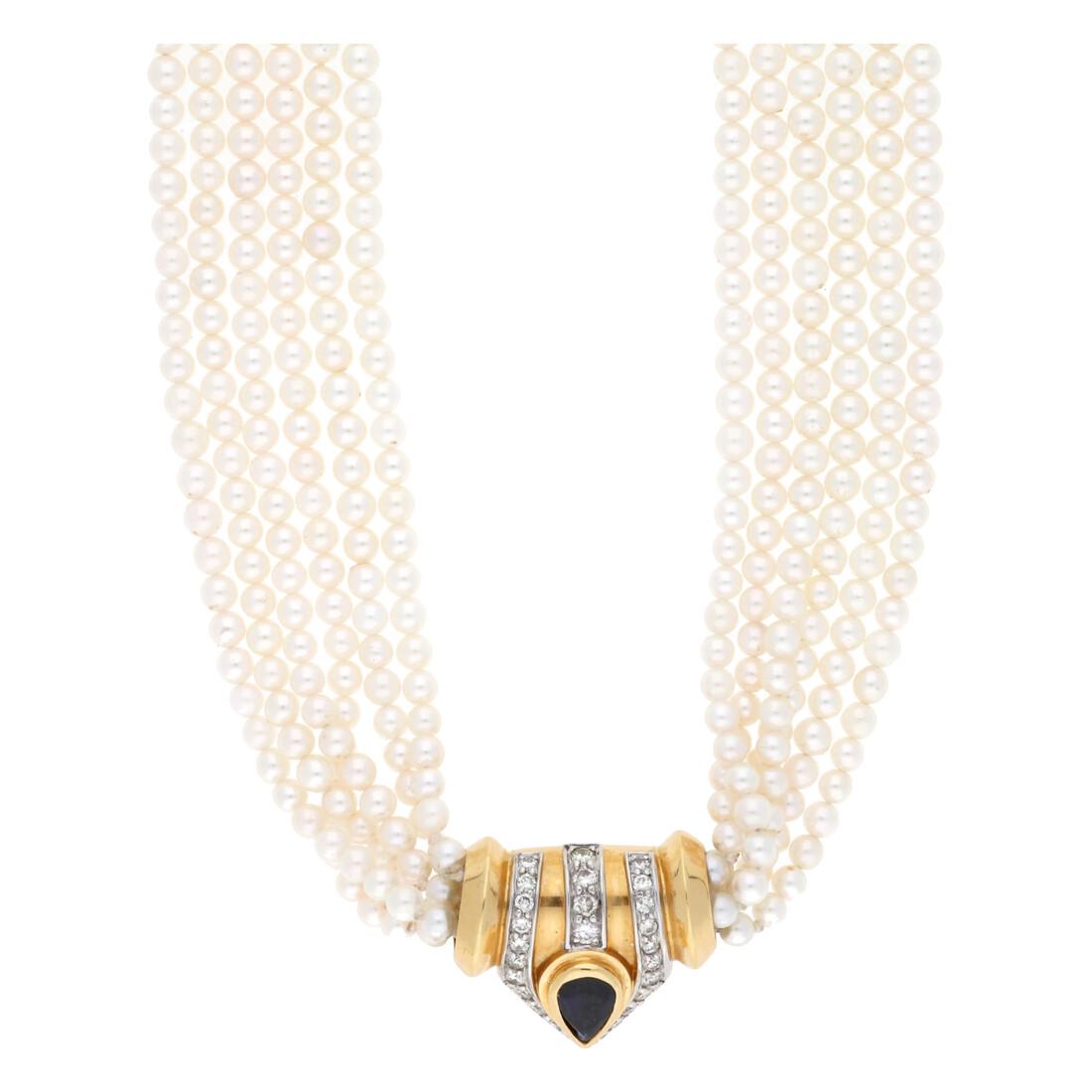 OCTAVI SARDA. Choker with six strands of pearls.: Gold with 18K white gold views, cultured pearls of 3-3.5 mm in diam., pear cut sapphire, 0.95 cts and brilliant cut diamonds, 0.62 cts. Hallmarked. 36.5 cm. 44.85 gr.