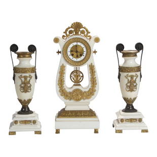 Fine Quality White Marble Ormolu Mounted Lyre Form: Empire style lyre form clock with fine ormolu mounts and pendulum with two doves. White marble and gilt bronze. France. Late 19th century. Approximately 18 inches high