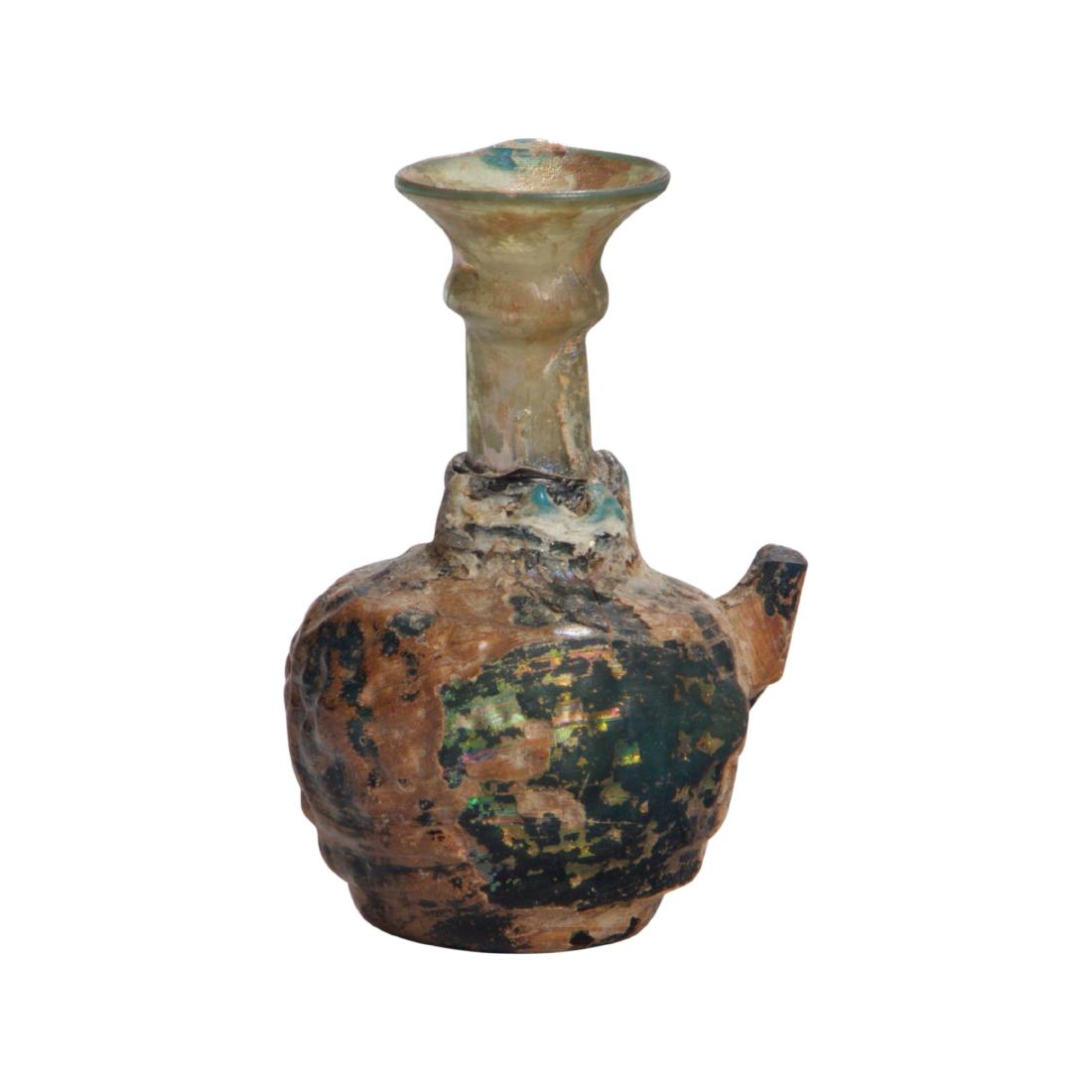 Ancient Islamic Glass Oil Bottle: Circa 8th century AD. Size 3.25 inches high.