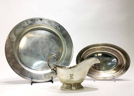 Gorham Sterling Silver Platters & Gravy Boat: Three sterling silver platters and gravy boat from Gorham. Large plate 13 inches. Weight: 1510g. Property from the Estate of Jane Rothschild