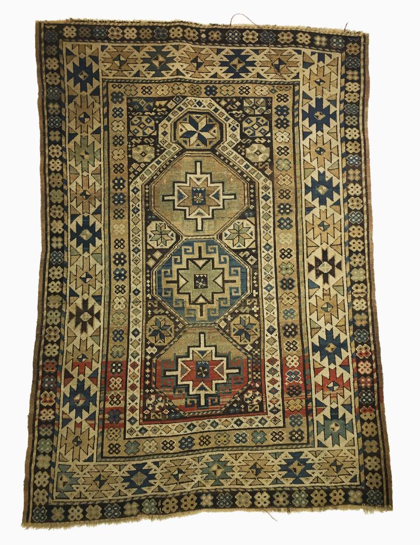A Caucasian Wool Carpet: A Caucasian handmade wool carpet. W 38.5 in x L 57 in. Property from the Estate of Jane Rothschild
