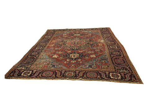Persian Heriz Carpet / Rug: Persian Heriz carpet / rug. 11 ft 3 in x 9 ft. Damaged