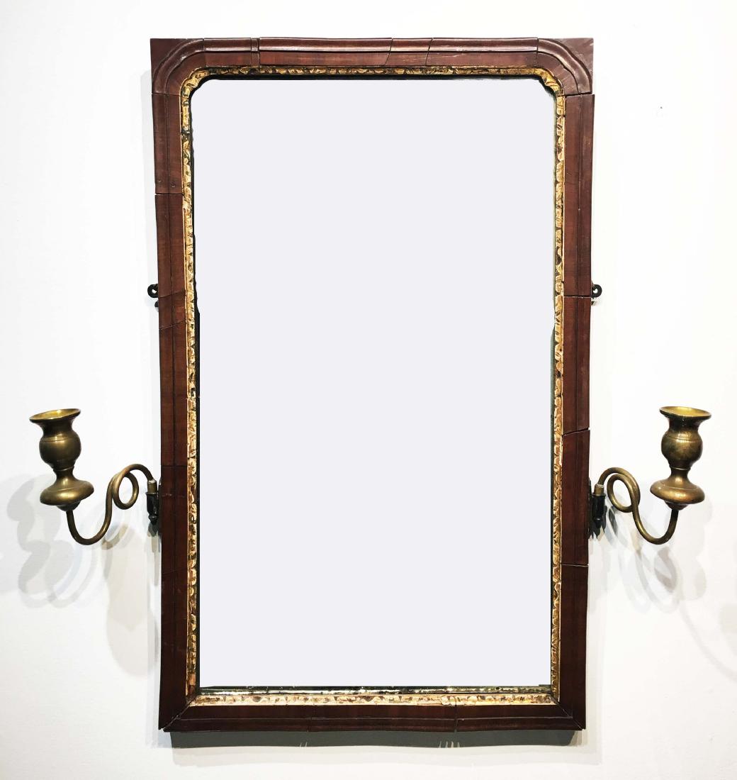 Antique English Mirror with Brass Candle Holders: 19th century English mirror with candle holders. Mirror size 16.5 in x 26.5 in. Property from the Estate of Jane Rothschild