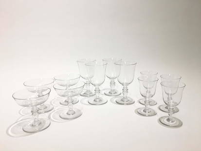 A Set of Baccarat Crystal Glasses: A set of Baccarat crystal glasses. 12 pieces. Tallest 6.25 in. Property from the Estate of Jane Rothschild.