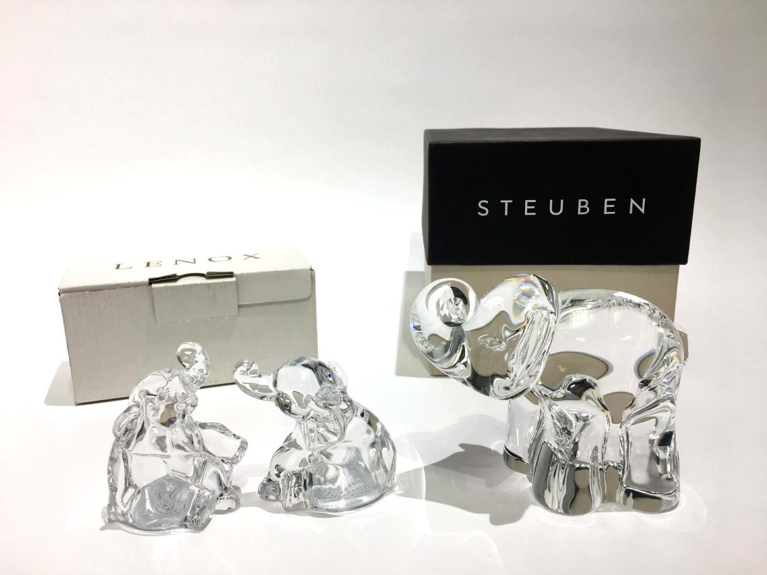 Crystal Elephants from Lenox and Steuben: Lenox salt & pepper shaker and Steuben crystal sculpture. Largest, length 5 in. Property from the Estate of Jane Rothschild