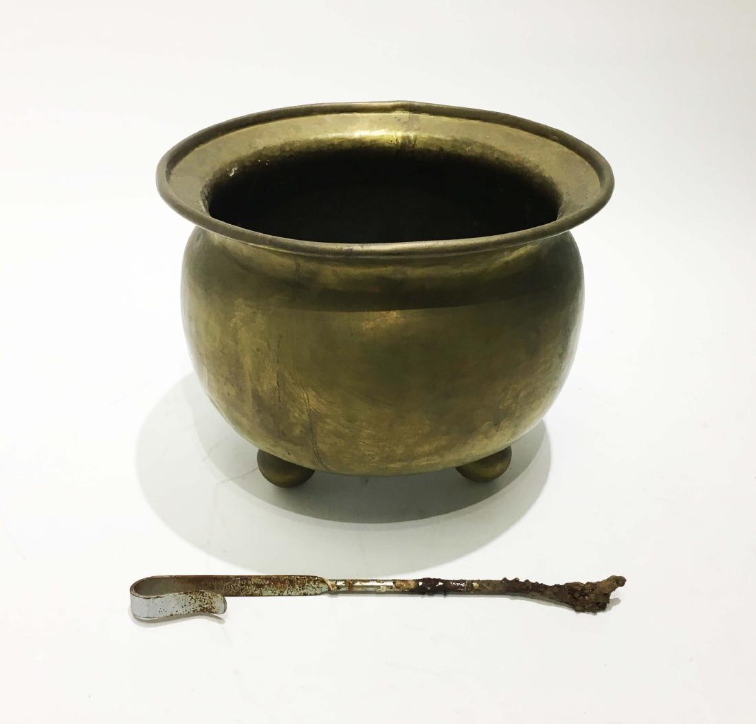 An Antique Brass Ash Bucket: An antique English brass ash bucket. 19th century H 8.5 in x Dia 10.5 in. Property from the Estate of Jane Rothschild
