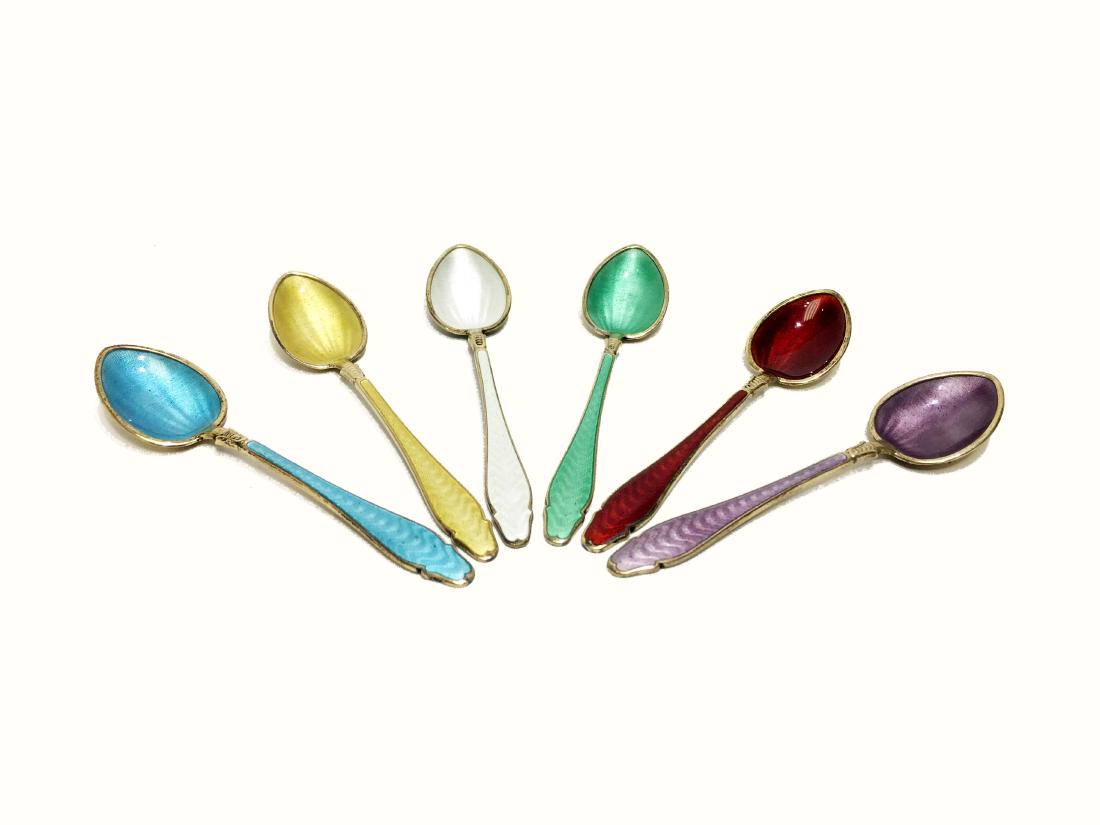 A Set of Sterling Enameled Teaspoons: A set of sterling enameled teaspoons. 4 inches. Weight: 70g. Property from the Estate of Jane Rothschild