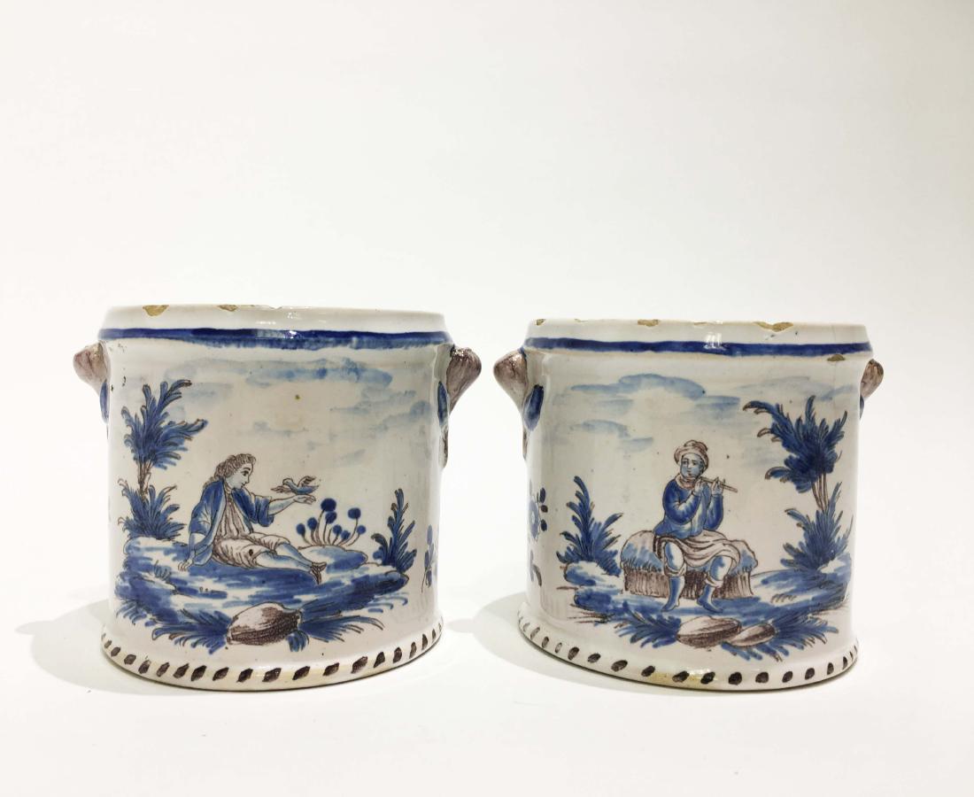Pair of Delft Blue & White Pots: A pair of tin-glazed earthenware pots. Probably Dutch, of the 18th century. Height 3 in. Property from the Estate of Jane Rothschild