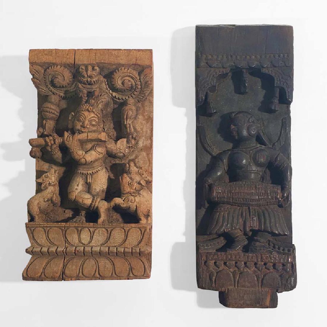 Two Indian Carved Wooden Architectural Elements: Two Indian carved wooden architectural elements. One depicting a flute player and the other a dancer with instrument (older possibly 18th century). Tallest is 15 1/2 inches, smaller 12 inches