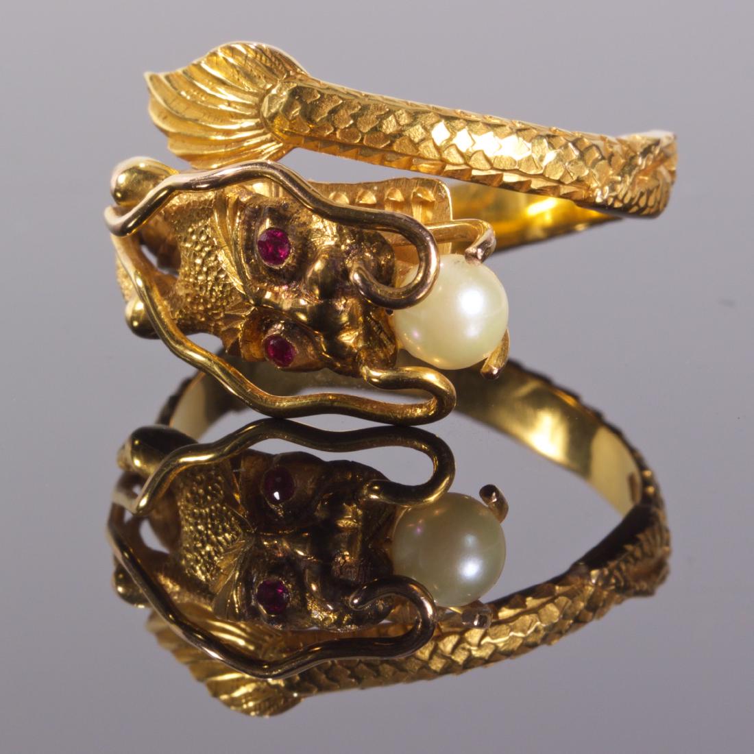 Antique 18K Gold Dragon Ring with Pearl and Ruby Eyes: Antique 18K gold dragon ring with pearl and ruby eyes. Size flexible on finger. Marked 18K gold.