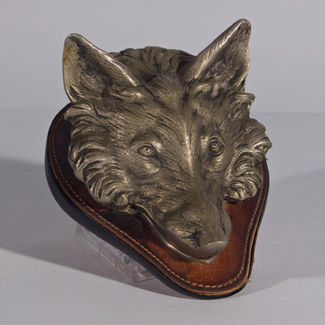 Gucci Signed Leather & Pewter Fox-head Clip: Gucci signed fox-head clip. Made in Italy by Gucci. Leather, suede and pewter. Height 6.75 inches; width 5 inches; depth 3.5 inches.