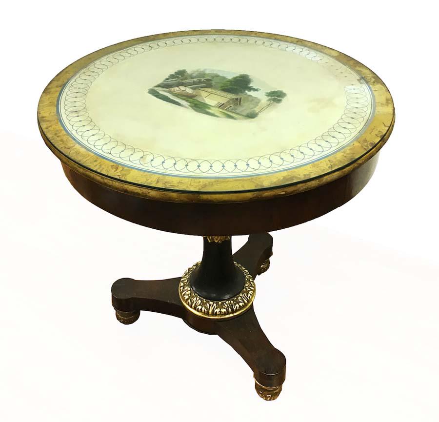 Russian Mahogany & Ebony Imperial Table, Published: Russian Imperial Table,ca. 1820, in mahogany, ebony and gilt with a farm scene painted in tempera. Published: "Russian Imperial Style" by Laura Cerwinske 1990, page 135. Missing glass. Height 31 inche