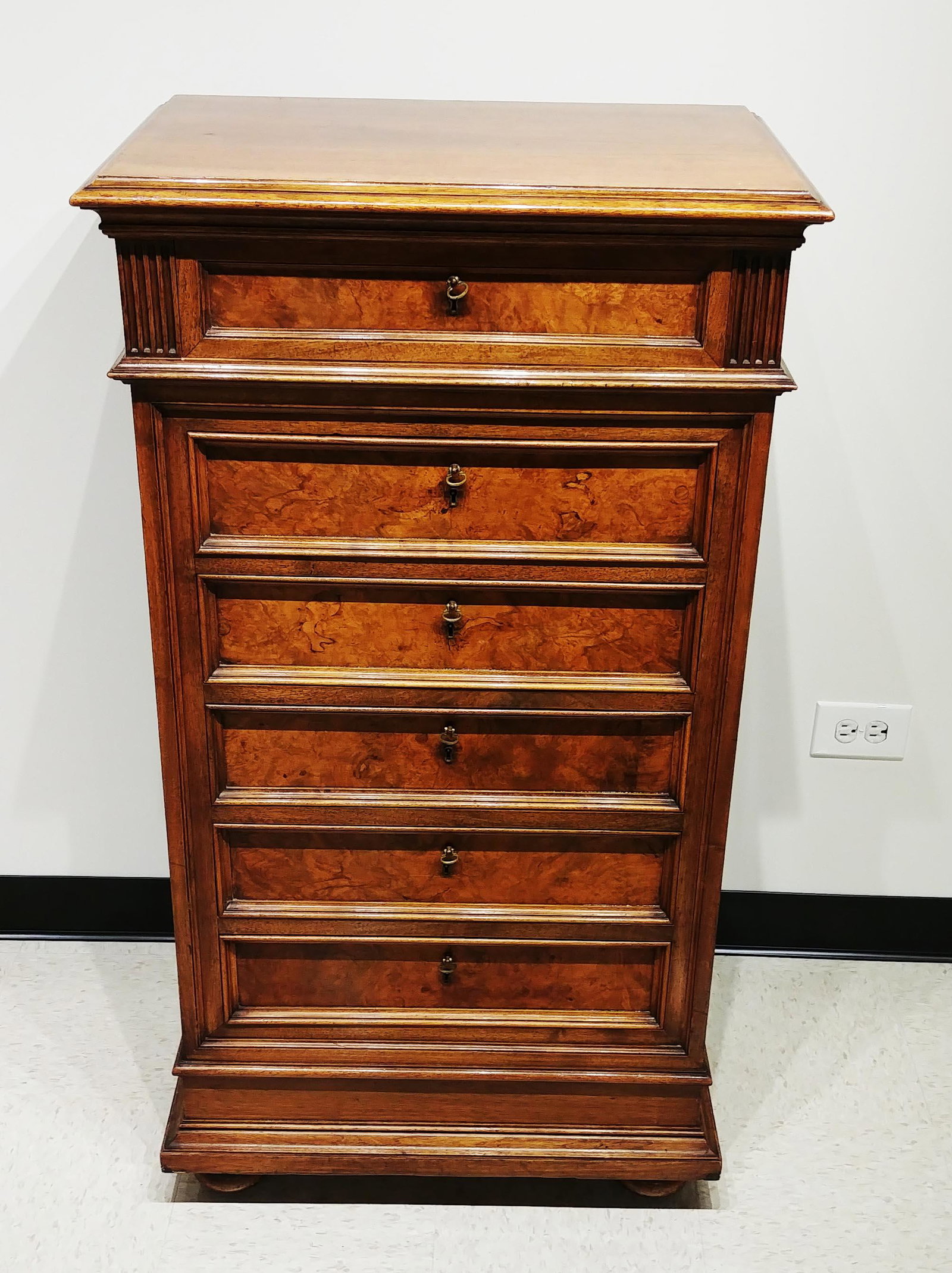 A Biedermeier Chest of Drawers: An English Biedermeier bureau chest of 6 drawers. 46 x 25 1/8 x 17 1/8 inches