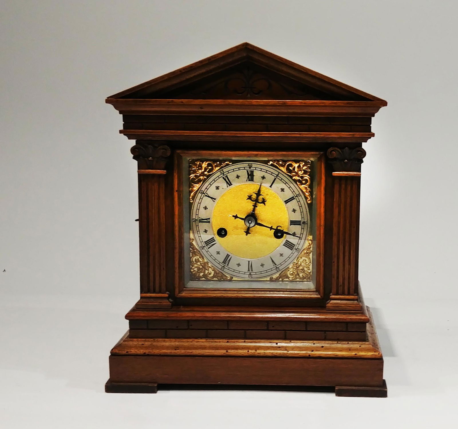 An English Mantle Clock, Mid Twentieth Century. NO: An English mantle clock. 20th century with key. 11 5/8 x 10 inches. NO RESERVE!