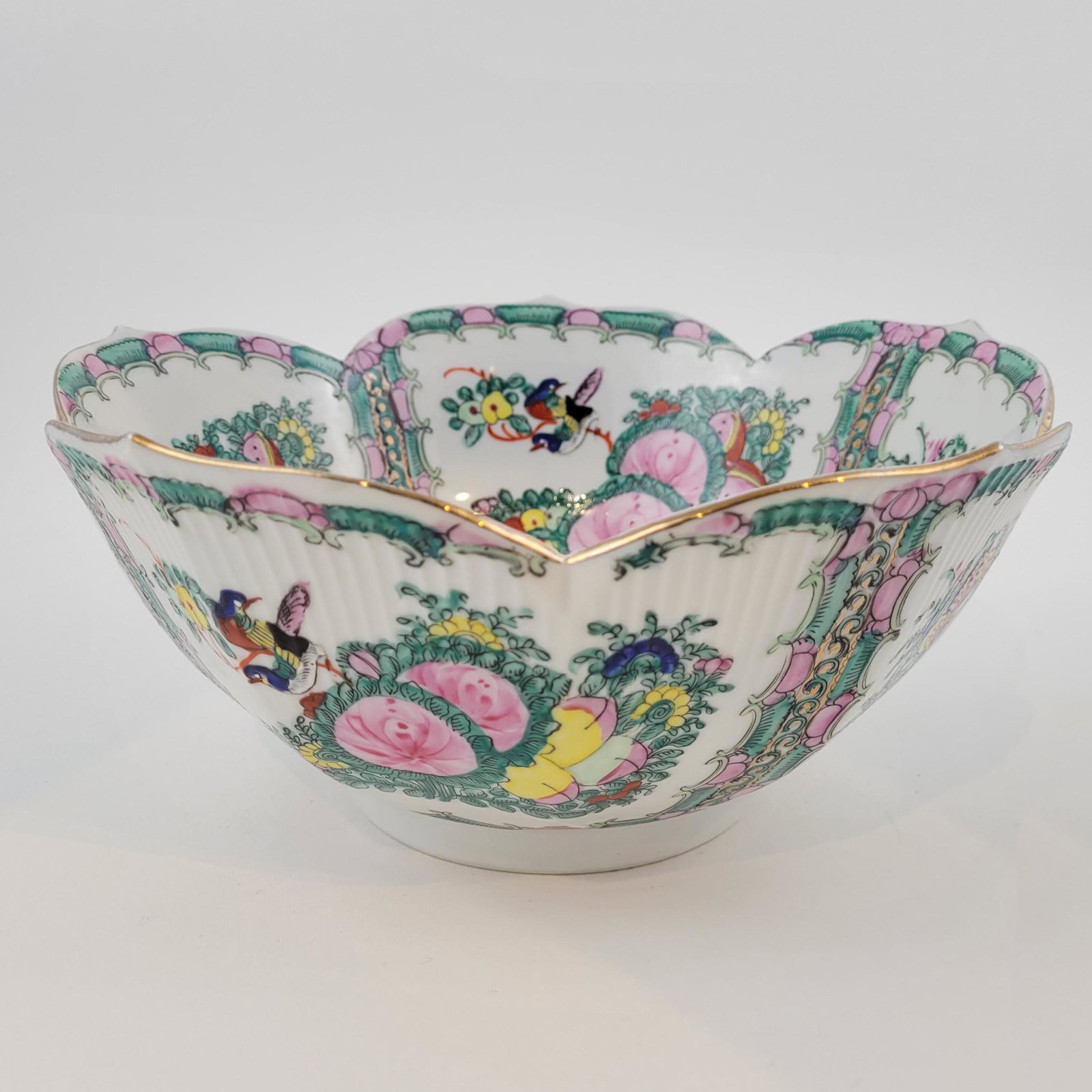 Chinese Famille Verde Porcelain Bowl: Chinese porcelain bowl with ridged body and pedal shaped rim. Diameter 10 inches Height 4 1/4 inches. marked on bottom. Property from the estate of Dr. Nafis Sadik, no reserve.