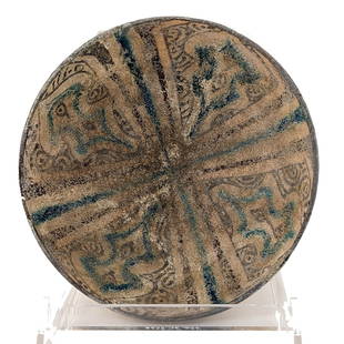 Sultanabad Pottery Bowl: A Sultanabad pottery bowl decorated on the interior with geometric design, ca. 12th century AD diam: 6 inches