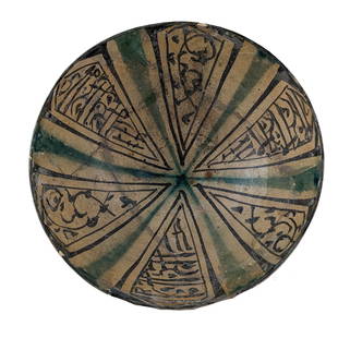 Nishapur Persian Glazed Pottery Bowl: Produced in the prominent Silk Road city of Nishapur during its peak as a political and economic center for the Seljuk rulers (10th and 12th centuries). Some restoration. 8.2 inches diameter, 3.75