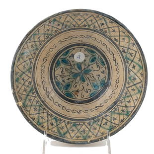 Nishapur Persian Glazed Pottery Bowl: Produced in the prominent Silk Road city of Nishapur during its peak as a political and economic center for the Seljuk rulers (10th and 12th centuries). Some restoration. 7.5 inches diameter, 3