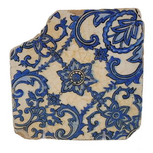 Persian Blue & White Pottery Tile: A Persian blue and white pottery tile. Late 17th century AD. As is. 8 x 8 inches.