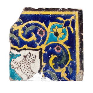 Safavid Cuerda Seca Pottery Tile, Late 17th century.: corner tile of a larger panel depicting a spotted leopard and gazelle surrounded by arabesque motifs. late 17th century, Iran. 9 x 9 inches