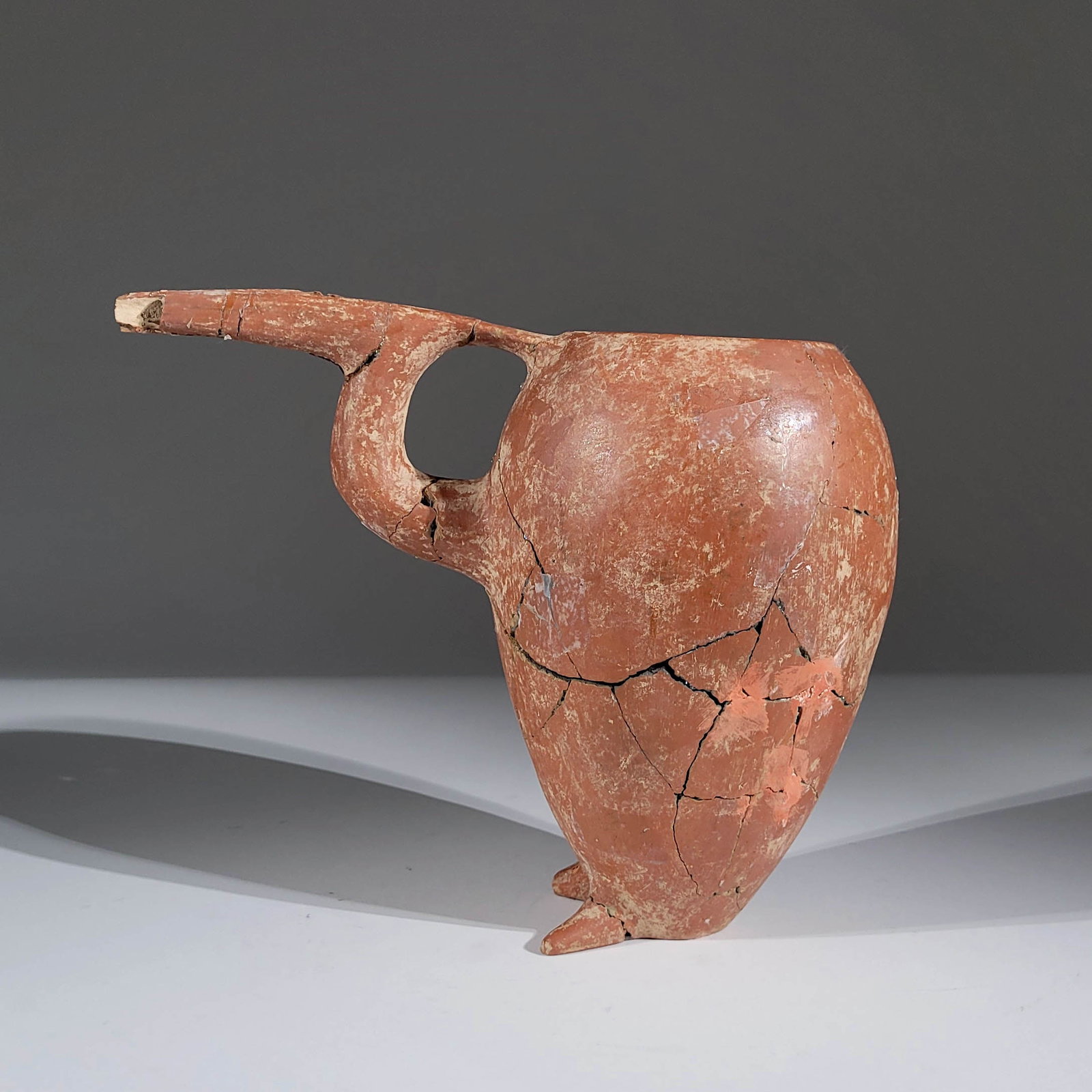 Pelican Terracotta Formed Vase with Feet: Pelican terracotta formed vase with feet. 1000 BC. Northern Iran, circa 1000 BC. 7.5 x 9 x 5 inches.