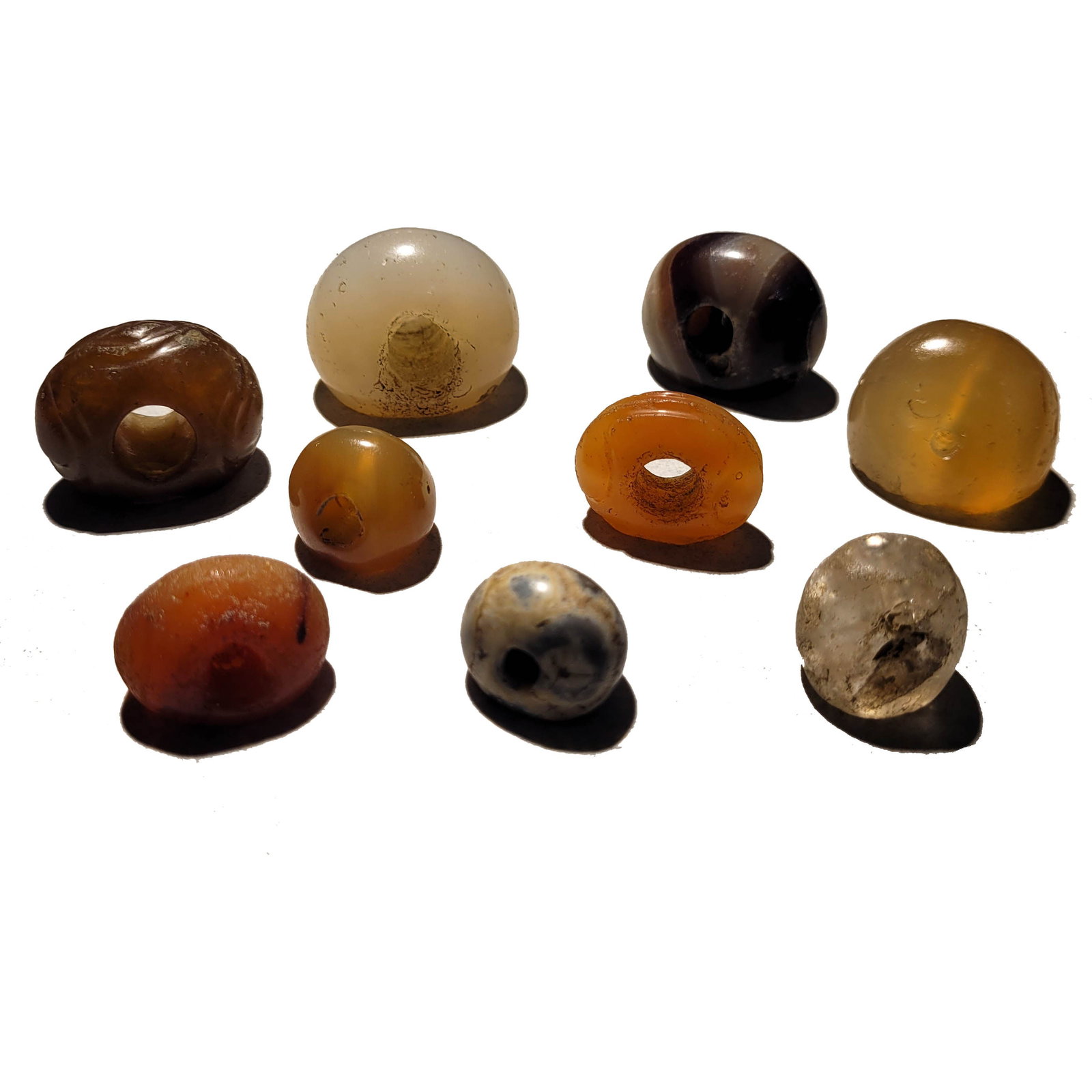 Group of Sasanian Seals, Agate and Carnelian: A group of nine Sasanian stone stamp seals. 4th -5th century AD. largest: 1 1/8 x 3/4 x 3/4 inch. (9 pieces). Property of the estate of Richard Ettinghausen.