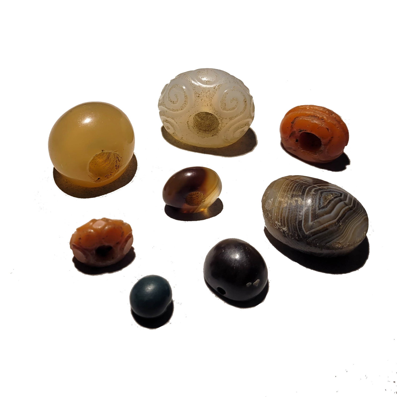 Group of Sasanian Seals, Agate and Carnelian: A group of nine Sasanian stone stamp seals. 4th -5th century AD. largest: 1 1/4 x 5/8 x 7/8 inch. (8 pieces). Property of the estate of Richard Ettinghausen.