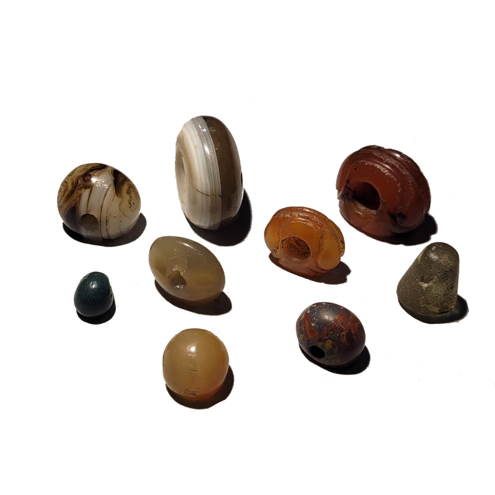 Group of Sasanian Seals, Agate and Carnelian: A group of nine Sasanian stone stamp seals. 4th -5th century AD. largest: 1 1/4 x 5/8 x 1 inch. (9 pieces). Property of the estate of Richard Ettinghausen.
