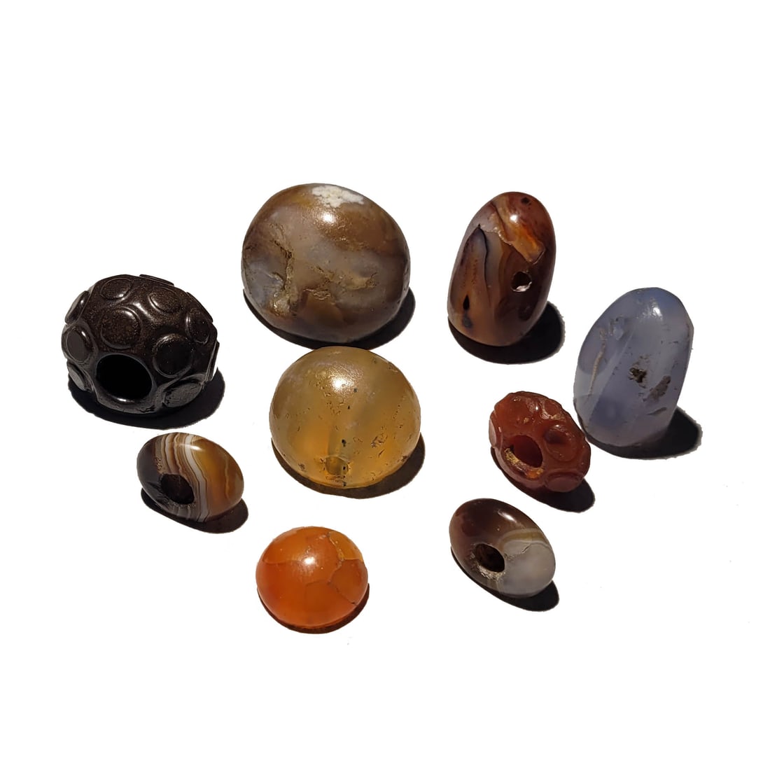 Group of Sasanian Seals, Agate and Carnelian: A group of nine Sasanian stone stamp seals. 4th -5th century AD. largest: 1 1/8 x 1 x 3/4 inch. (9 pieces). Property of the estate of Richard Ettinghausen.