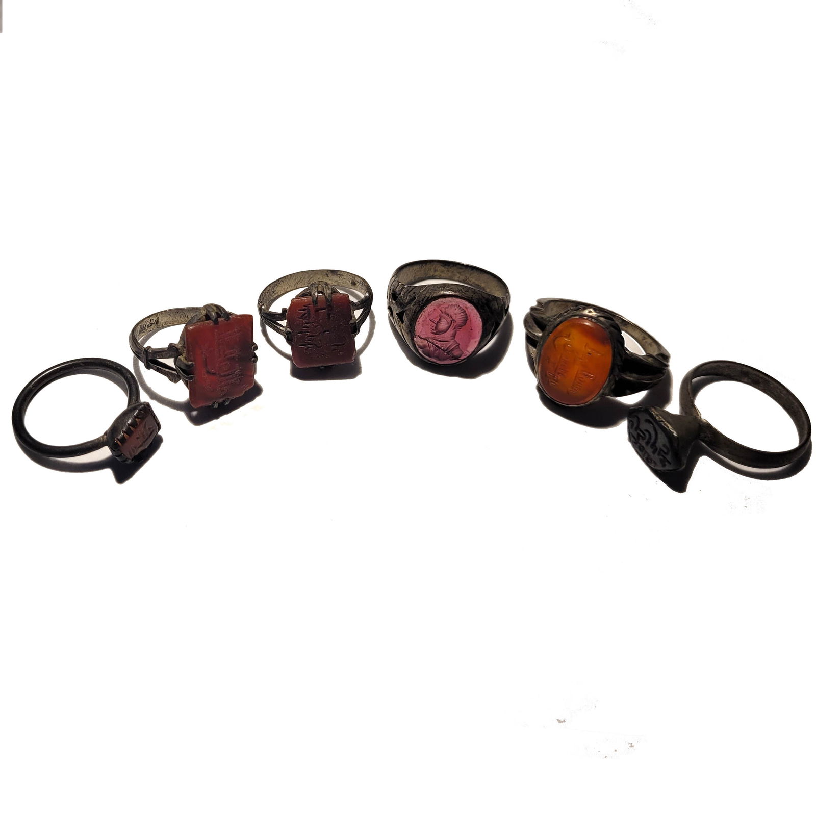 Six Islamic Seal Rings, Carnelian, Silver and Glass (1 of 5)