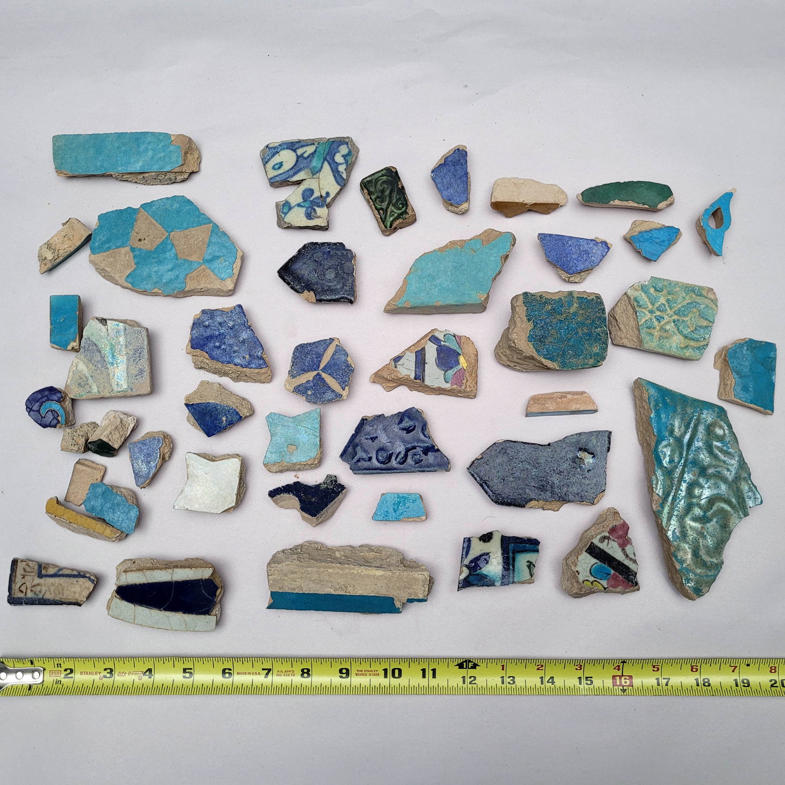 Group of Early Islamic Pottery Shards: Group of shards and pottery fragments from 9 - 15th centuries. See illustrations. Property from the Estate of Richard Ettinghausen.
