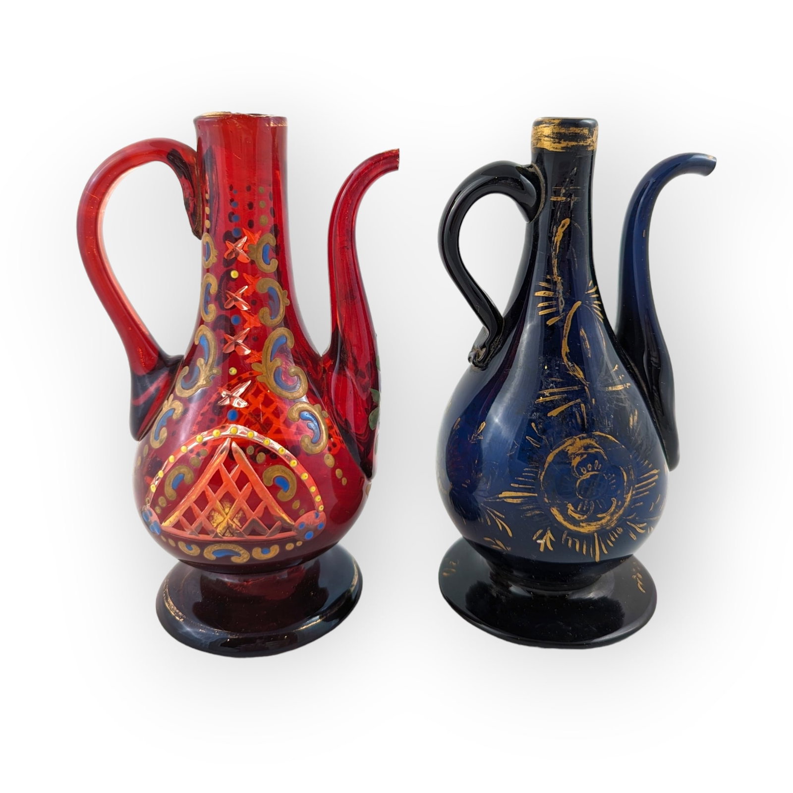 Bohemian Cut Glass Ewers With Handle: Bohemian cut glass ewers with handle. Long tapered spouts. Larger ewer measures 7.25 x 3 x 4.5 inches.