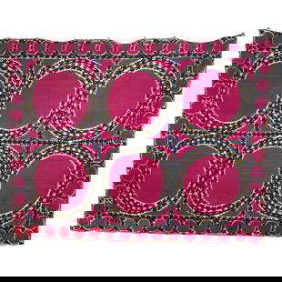 Central Asian Suzani with Silk Embroidery: Central Asian cotton Suzani with silk embroidery. The main theme of the textile are magenta scalloped circles that form the field and borders. The textile appears to be created from panels sown togeth