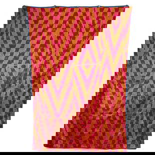 Central Asian Silk Ikat with Geometric Motifs: Central Asian silk ikat with geometric motifs. The vibrant textile features a bold ikat pattern in chevron and diamond motifs. The piece is bordered with a simple blue edge and backed with cotton