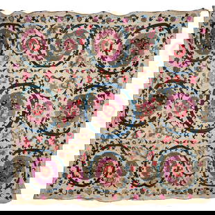 Bukharian Suzani with Large Floral Roundels: Bukharian suzani with large floral roundels. The white ground is completely covered in embroidered roundels, flowers, and navy colored leaves. The textile shows some perforations and areas of thread